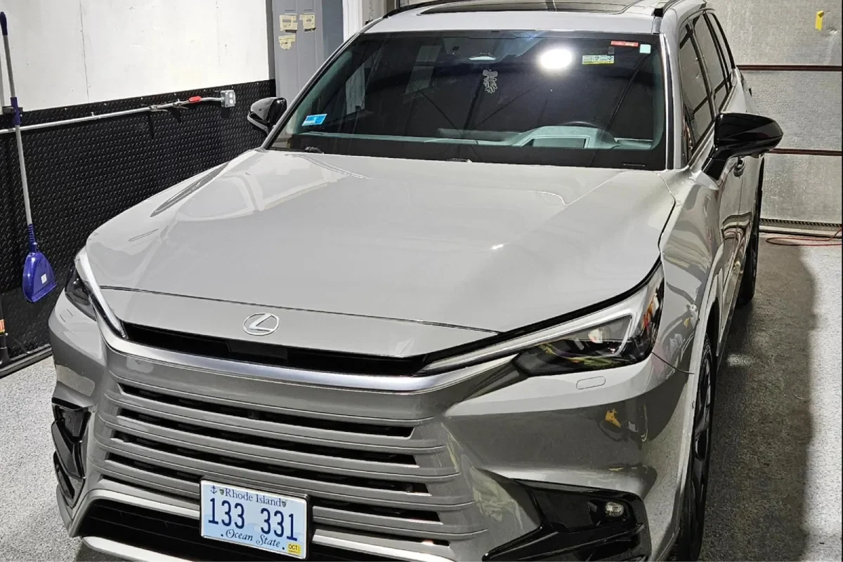 Close-up of gray Lexus RX in garage with shiny exterior