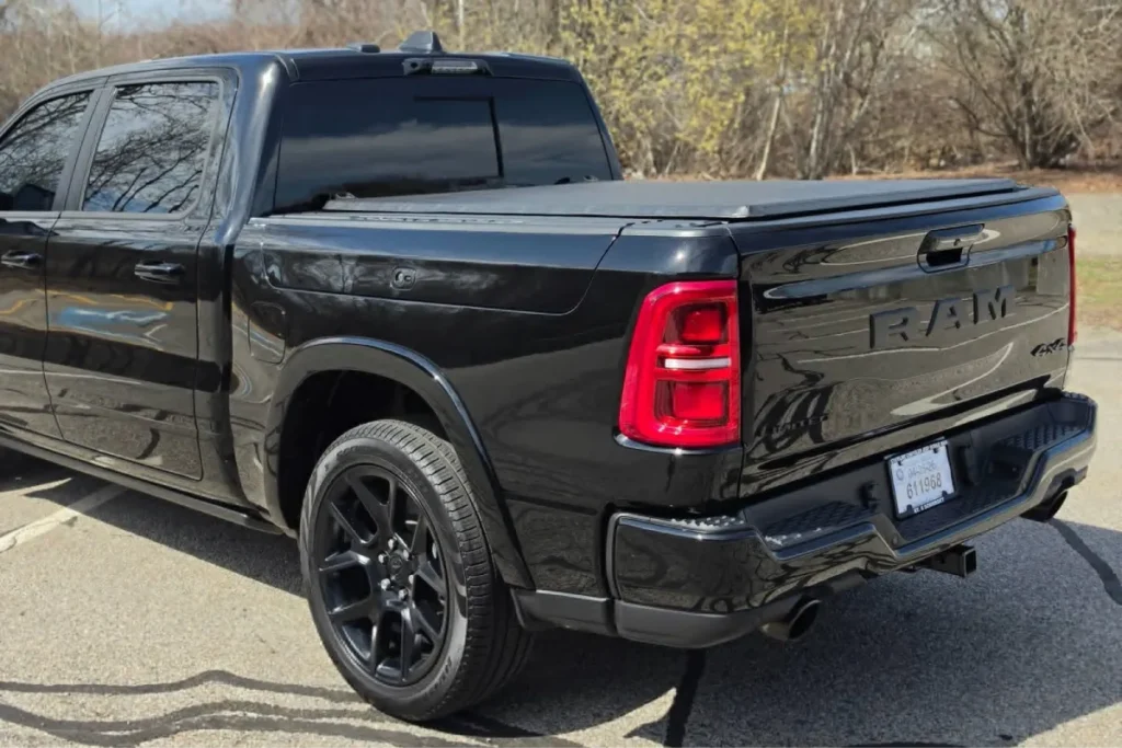 Rear view of black car with ceramic coating protection.