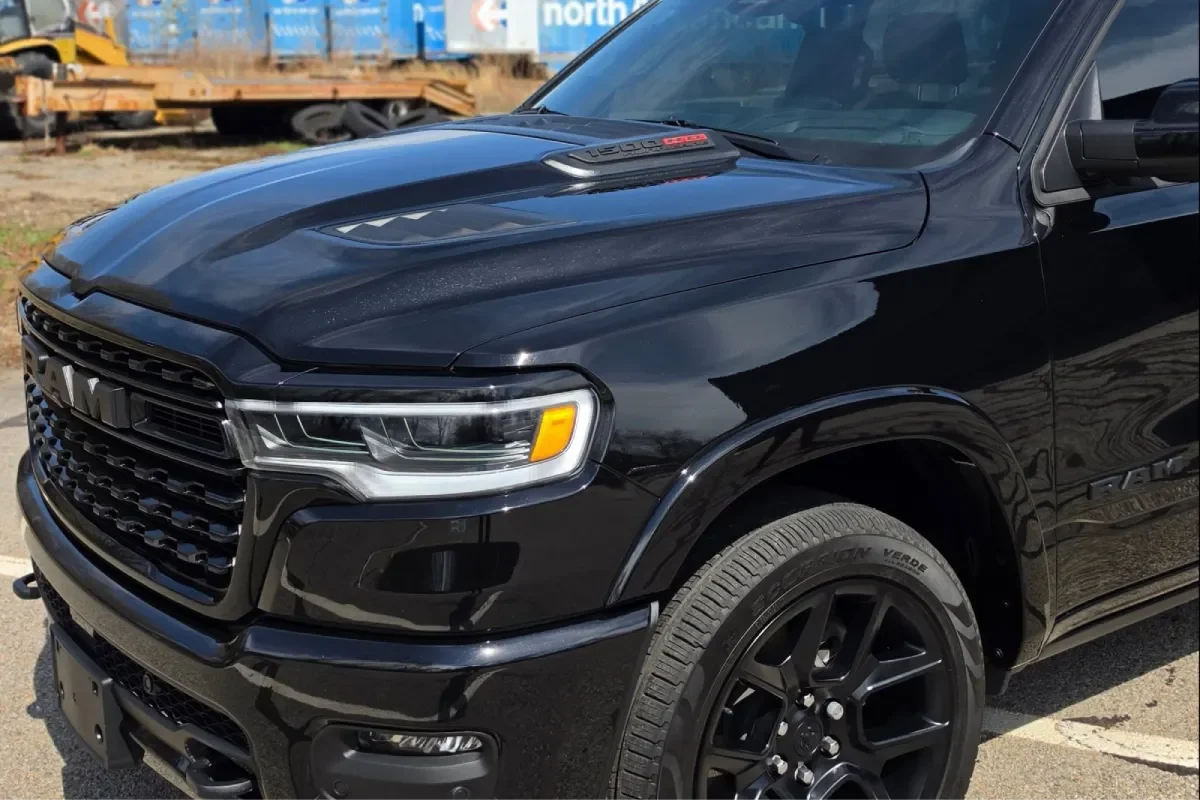 Black car with glossy ceramic coating finish.
